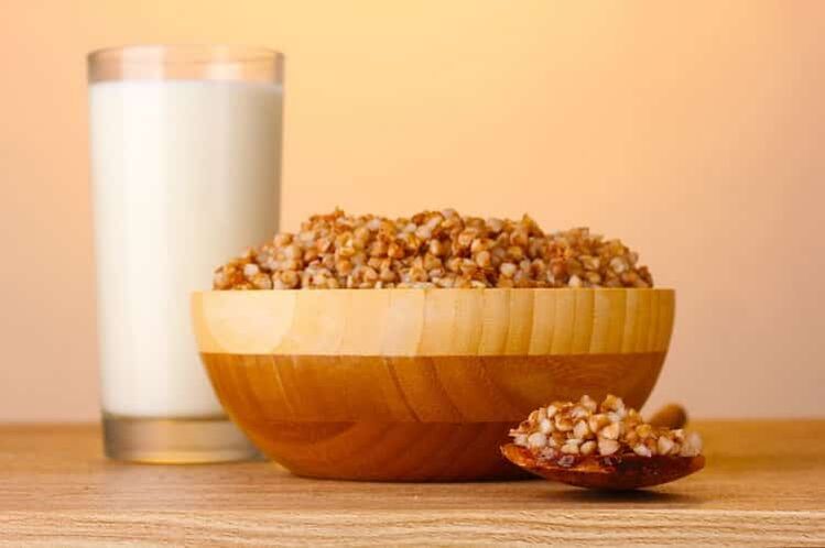 Saracen wheat porridge and milk glass